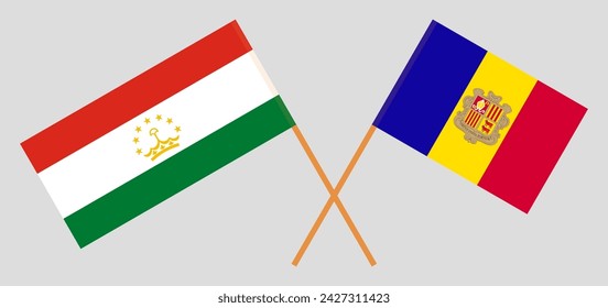 Crossed flags of Tajikistan and Andorra. Official colors. Correct proportion. Vector illustration
