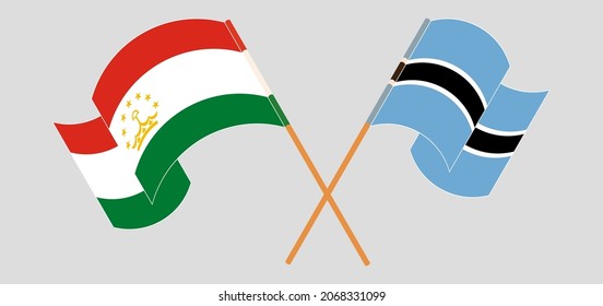 Crossed flags of Tajikistan and Botswana. Official colors. Correct proportion
