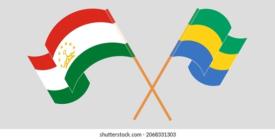 Crossed flags of Tajikistan and Gabon. Official colors. Correct proportion