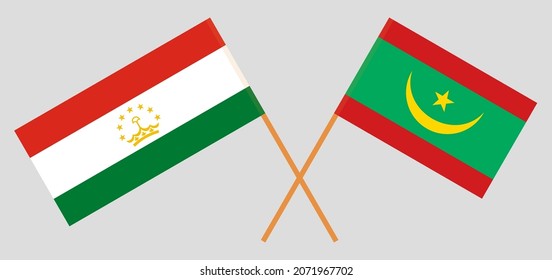 Crossed flags of Tajikistan and Mauritania. Official colors. Correct proportion