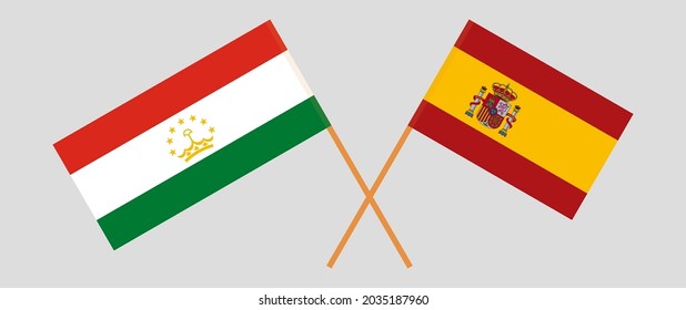 Crossed flags of Tajikistan and Spain. Official colors. Correct proportion