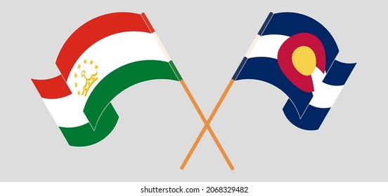 Crossed flags of Tajikistan and The State of Colorado. Official colors. Correct proportion