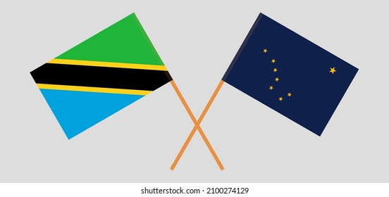 Crossed flags of Tanzania and the State of Alaska. Official colors. Correct proportion. Vector illustration
