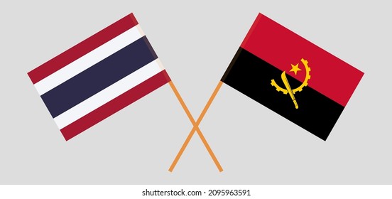 Crossed flags of Thailand and Angola. Official colors. Correct proportion. Vector illustration
