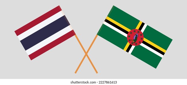 Crossed flags of Thailand and Dominica. Official colors. Correct proportion. Vector illustration
