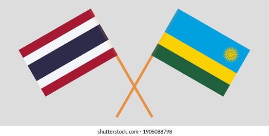 Crossed flags of Thailand and Rwanda