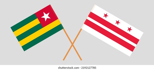 Crossed flags of Togo and the District of Columbia. Official colors. Correct proportion. Vector illustration
