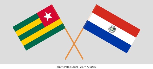 Crossed flags of Togo and Republic of Paraguay. Official colors. Correct proportion. Vector illustration.
