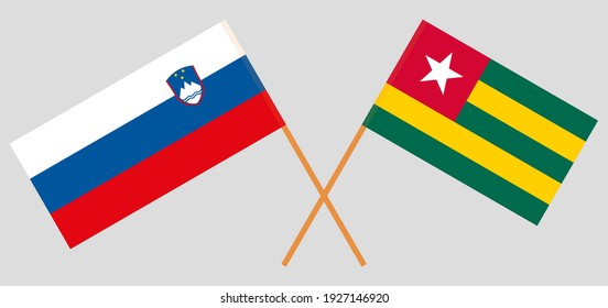 Crossed flags of Togo and Slovenia. Official colors. Correct proportion