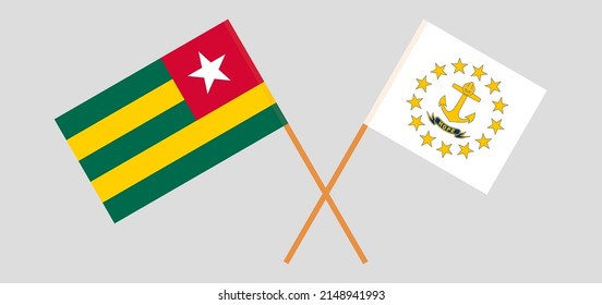 Crossed flags of Togo and the State of Rhode Island. Official colors. Correct proportion. Vector illustration
