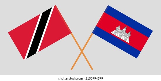 Crossed flags of Trinidad and Tobago and Cambodia. Official colors. Correct proportion. Vector illustration
