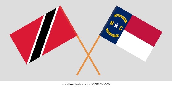 Crossed flags of Trinidad and Tobago and The State of North Carolina. Official colors. Correct proportion