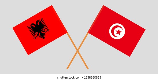 Crossed flags of Tunisia and Albania