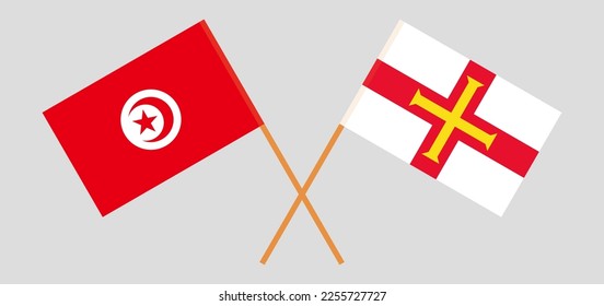 Crossed flags of Tunisia and Bailiwick of Guernsey. Official colors. Correct proportion. Vector illustration
