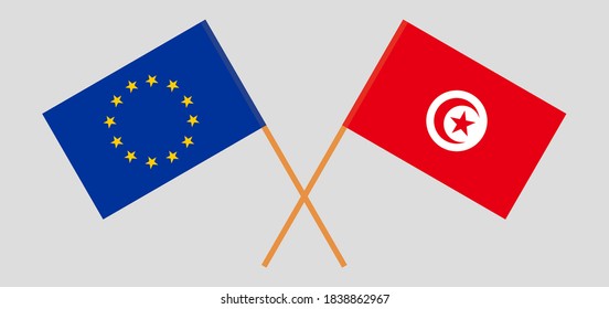 Crossed flags of Tunisia and the EU