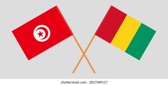 Crossed flags of Tunisia and Guinea. Official colors. Correct proportion