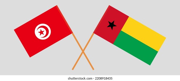 Crossed flags of Tunisia and Guinea-Bissau. Official colors. Correct proportion. Vector illustration
