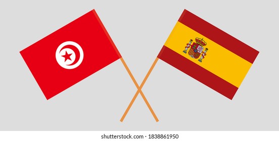 Crossed flags of Tunisia and Spain