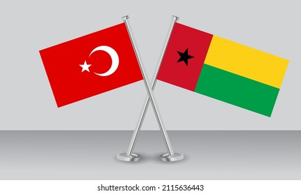 Crossed flags of Türkiye (Turkey) and Guinea-Bissau. Official colors. Correct proportion. Banner design