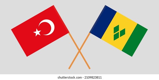 Crossed flags of Turkey and Saint Vincent and the Grenadines. Official colors. Correct proportion. Vector illustration
