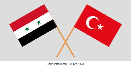Crossed flags of Turkey and Syria