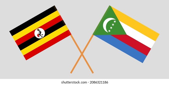 Banderas cruzadas de Uganda y las Comoras. Colores oficiales. Proporción correcta. Ilustración del vector

