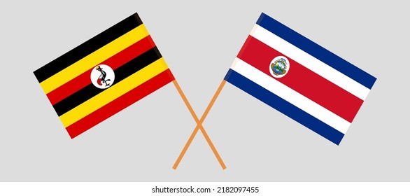 Crossed flags of Uganda and Costa Rica. Official colors. Correct proportion. Vector illustration
