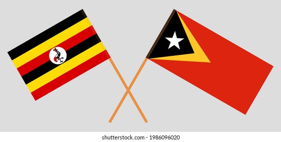 Banderas cruzadas de Uganda y Timor Oriental. Colores oficiales. Proporción correcta