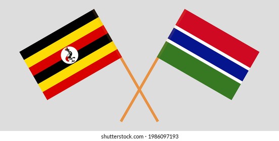 Crossed flags of Uganda and the Gambia. Official colors. Correct proportion