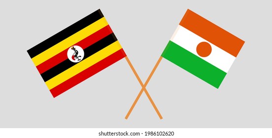 Banderas cruzadas de Uganda y Níger. Colores oficiales. Proporción correcta