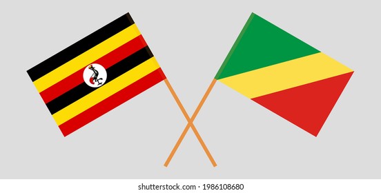 Gekreuzte Flaggen Ugandas und der Republik Kongo. Offizielle Farben. Richtiger Anteil