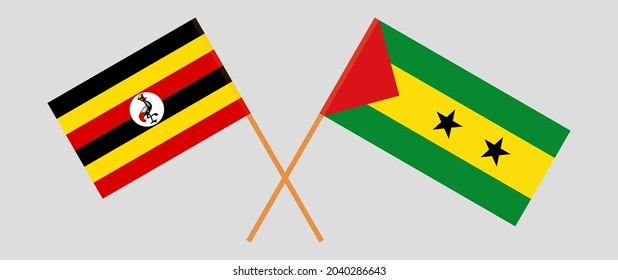 Crossed flags of Uganda and Sao Tome and Principe. Official colors. Correct proportion