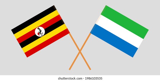 Crossed flags of Uganda and Sierra Leone. Official colors. Correct proportion