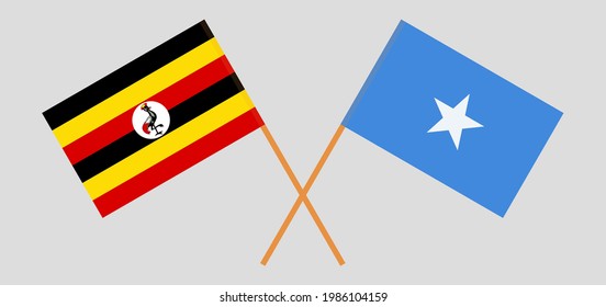 Banderas cruzadas de Uganda y Somalia. Colores oficiales. Proporción correcta