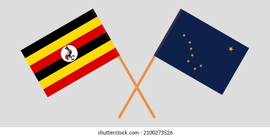 Crossed flags of Uganda and the State of Alaska. Official colors. Correct proportion. Vector illustration
