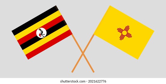 Crossed flags of Uganda and the State of New Mexico. Official colors. Correct proportion