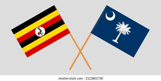 Crossed flags of Uganda and The State of South Carolina. Official colors. Correct proportion. Vector illustration

