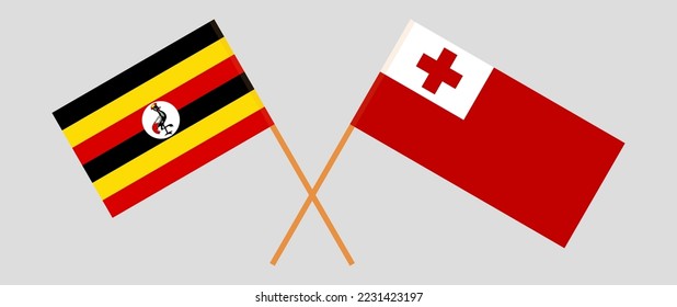 Überkreuzte Flaggen von Uganda und Tonga. Offizielle Farben. Richtiger Anteil. Vektorgrafik
