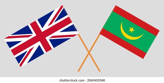 Crossed flags of the UK and Mauritania. Official colors. Correct proportion