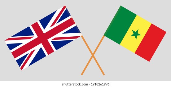 Crossed flags of the UK and Senegal