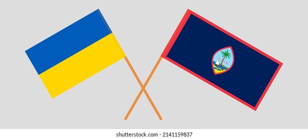 Crossed flags of Ukraine and Guam. Official colors. Correct proportion. Vector illustration
