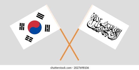 Crossed flags of Ukraine and Islamic Emirate of Afghanistan