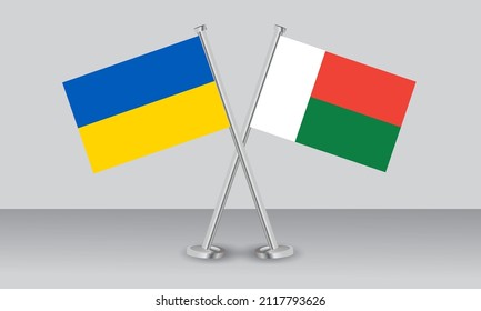 Crossed flags of Ukraine and Madagascar. Official colors. Correct proportion. Banner design