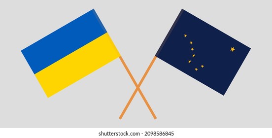 Crossed flags of Ukraine and the State of Alaska. Official colors. Correct proportion. Vector illustration
