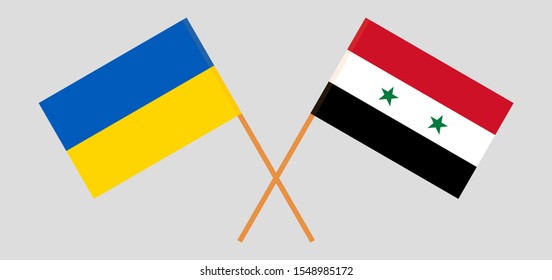 Crossed flags of the Ukraine and Syria