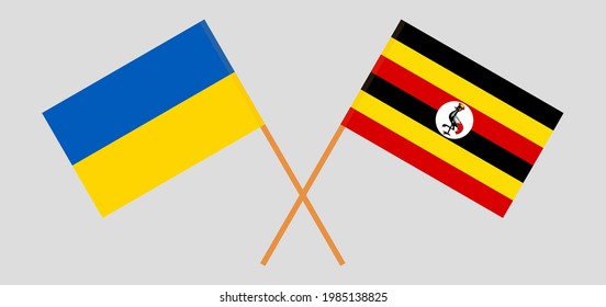 Crossed flags of Ukraine and Uganda. Official colors. Correct proportion