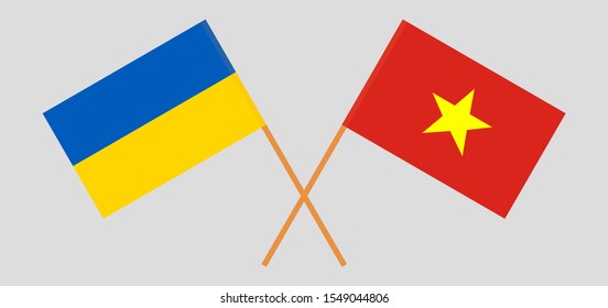 Crossed flags of the Ukraine and Vietnam