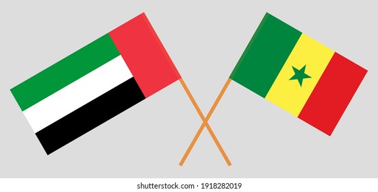 Crossed flags of the United Arab Emirates and Senegal