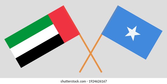 Crossed flags of the United Arab Emirates and Somalia. Official colors. Correct proportion