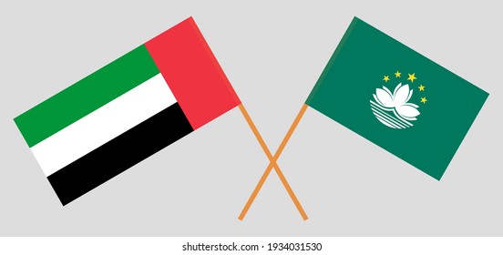 Crossed flags of the United Arab Emirates and Macau. Official colors. Correct proportion